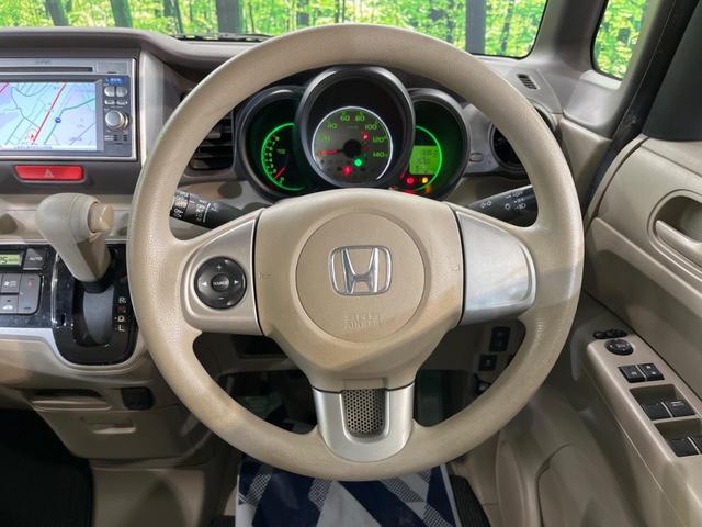 N-BOX G・Lパッケージ 電動スライドドア 禁煙車 スマートキー オートエアコン DVD再生 地デジ 電動格納ミラー ETC 衝突安全ボディ 盗難防止システム プライバシーガラス ドアバイザー 横滑り防止装置(11枚目)