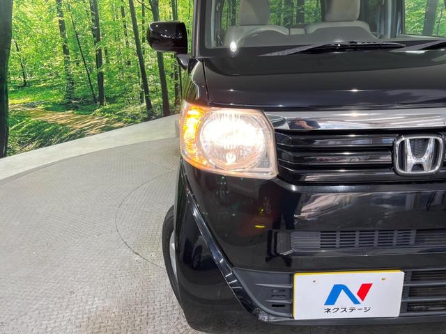 N-BOX G・Lパッケージ 電動スライドドア 禁煙車 スマートキー オートエアコン DVD再生 地デジ 電動格納ミラー ETC 衝突安全ボディ 盗難防止システム プライバシーガラス ドアバイザー 横滑り防止装置(12枚目)