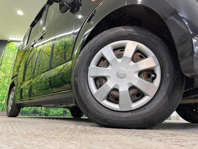 N-BOX G・Lパッケージ 電動スライドドア 禁煙車 スマートキー オートエアコン DVD再生 地デジ 電動格納ミラー ETC 衝突安全ボディ 盗難防止システム プライバシーガラス ドアバイザー 横滑り防止装置(13枚目)