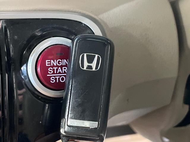 N-BOX G・Lパッケージ 電動スライドドア 禁煙車 スマートキー オートエアコン DVD再生 地デジ 電動格納ミラー ETC 衝突安全ボディ 盗難防止システム プライバシーガラス ドアバイザー 横滑り防止装置(35枚目)