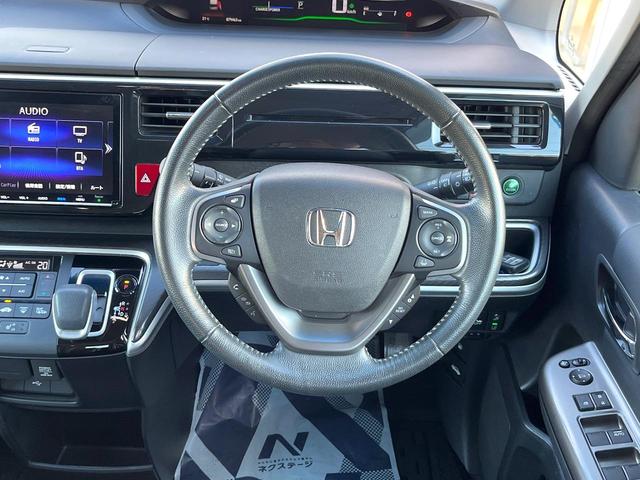 ステップワゴンスパーダ スパーダハイブリッド G・EX ホンダセンシング 両側電動ドア 純正SDナビ 全周囲カメラ 衝突被害軽減システム レーダークルーズ ハーフレザーシート スマートキー LEDヘッド ビルトインETC オートライト デュアルエアコン(9枚目)