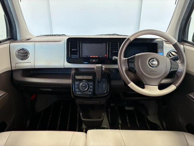 モコ ドルチェＸ　禁煙車ナビ　ＴＶ　オートライト　ＨＩＤ　スマートキー　アイドリングストップ　電動格納ミラー　ベンチシート　ＣＶＴ　盗難防止システム　ＡＢＳ　ＣＤ　アルミホイール　衝突安全ボディ　エアコン（3枚目）