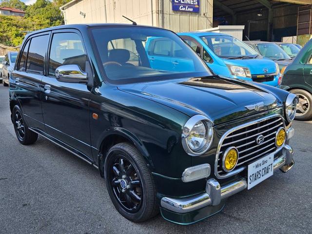 ミラジーノ ミニライトスペシャル　後期型　走行距離３１０００キロ　タイミングベルト＆ウォーターポンプ交換　純正レザー調黒シート　フォグ　Ｆリップ付　黒１４インチアルミ　国産タイヤ４本交換　ウッド調パネル　ウッドコンビハンドル　キーレス（3枚目）