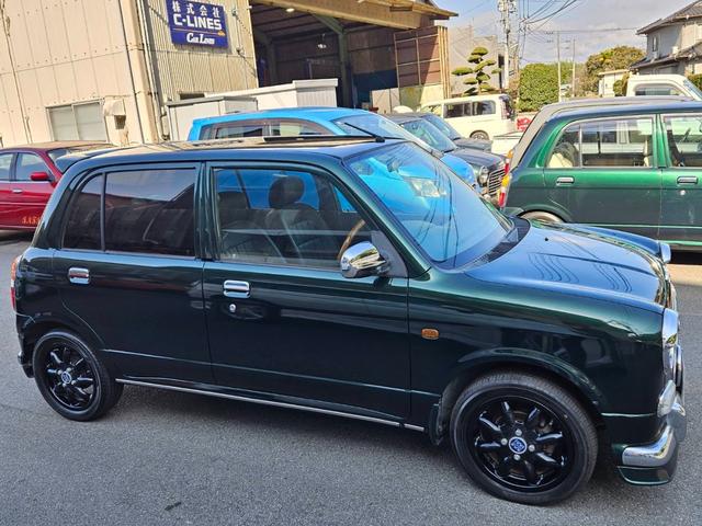 ミラジーノ ミニライトスペシャル　後期型　走行距離３１０００キロ　タイミングベルト＆ウォーターポンプ交換　純正レザー調黒シート　フォグ　Ｆリップ付　黒１４インチアルミ　国産タイヤ４本交換　ウッド調パネル　ウッドコンビハンドル　キーレス（7枚目）