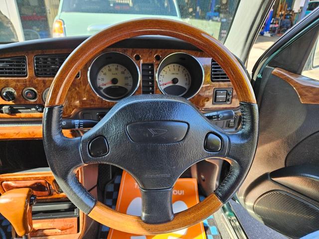 ミラジーノ ミニライトスペシャル　後期型　走行距離３１０００キロ　タイミングベルト＆ウォーターポンプ交換　純正レザー調黒シート　フォグ　Ｆリップ付　黒１４インチアルミ　国産タイヤ４本交換　ウッド調パネル　ウッドコンビハンドル　キーレス（14枚目）