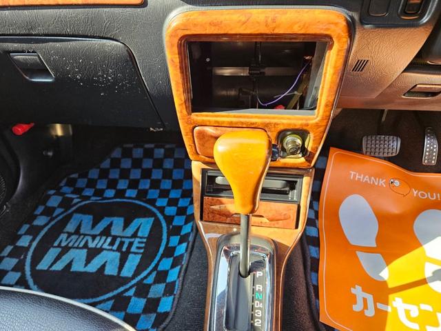 ミラジーノ ミニライトスペシャル　後期型　走行距離３１０００キロ　タイミングベルト＆ウォーターポンプ交換　純正レザー調黒シート　フォグ　Ｆリップ付　黒１４インチアルミ　国産タイヤ４本交換　ウッド調パネル　ウッドコンビハンドル　キーレス（16枚目）