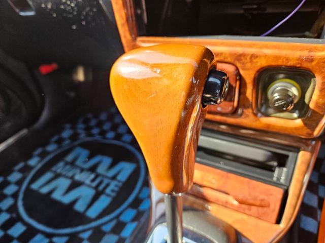 ミラジーノ ミニライトスペシャル　後期型　走行距離３１０００キロ　タイミングベルト＆ウォーターポンプ交換　純正レザー調黒シート　フォグ　Ｆリップ付　黒１４インチアルミ　国産タイヤ４本交換　ウッド調パネル　ウッドコンビハンドル　キーレス（17枚目）