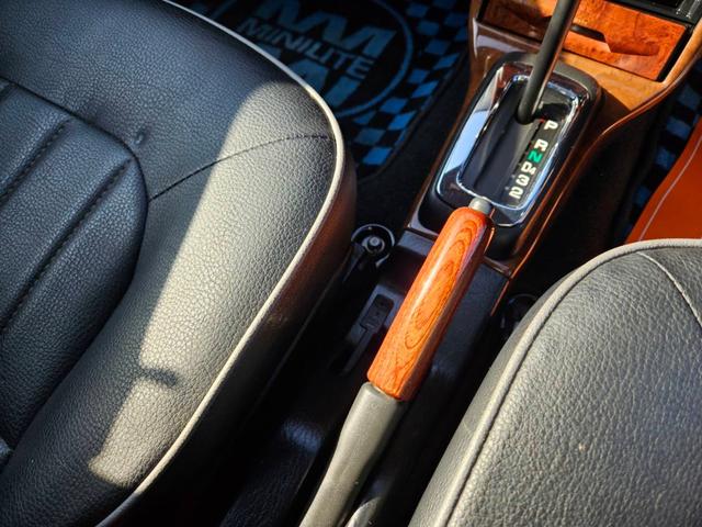 ミラジーノ ミニライトスペシャル　後期型　走行距離３１０００キロ　タイミングベルト＆ウォーターポンプ交換　純正レザー調黒シート　フォグ　Ｆリップ付　黒１４インチアルミ　国産タイヤ４本交換　ウッド調パネル　ウッドコンビハンドル　キーレス（18枚目）