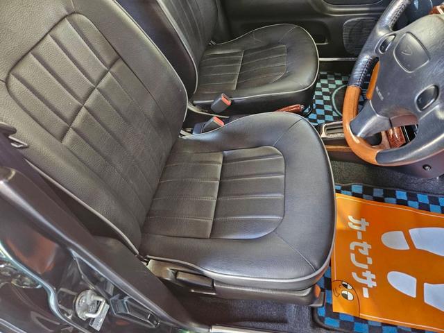 ミラジーノ ミニライトスペシャル　後期型　走行距離３１０００キロ　タイミングベルト＆ウォーターポンプ交換　純正レザー調黒シート　フォグ　Ｆリップ付　黒１４インチアルミ　国産タイヤ４本交換　ウッド調パネル　ウッドコンビハンドル　キーレス（20枚目）