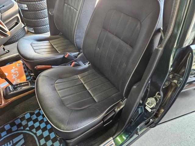 ミラジーノ ミニライトスペシャル　後期型　走行距離３１０００キロ　タイミングベルト＆ウォーターポンプ交換　純正レザー調黒シート　フォグ　Ｆリップ付　黒１４インチアルミ　国産タイヤ４本交換　ウッド調パネル　ウッドコンビハンドル　キーレス（22枚目）