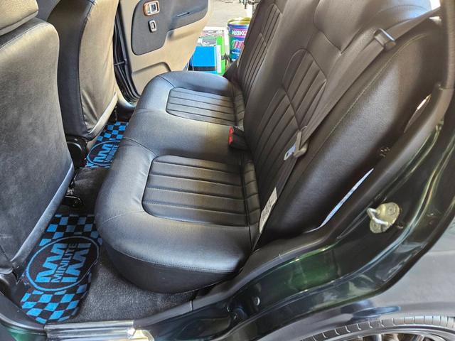 ミラジーノ ミニライトスペシャル　後期型　走行距離３１０００キロ　タイミングベルト＆ウォーターポンプ交換　純正レザー調黒シート　フォグ　Ｆリップ付　黒１４インチアルミ　国産タイヤ４本交換　ウッド調パネル　ウッドコンビハンドル　キーレス（24枚目）