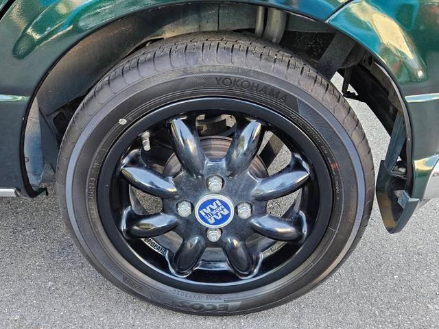 ミラジーノ ミニライトスペシャル　後期型　走行距離３１０００キロ　タイミングベルト＆ウォーターポンプ交換　純正レザー調黒シート　フォグ　Ｆリップ付　黒１４インチアルミ　国産タイヤ４本交換　ウッド調パネル　ウッドコンビハンドル　キーレス（35枚目）