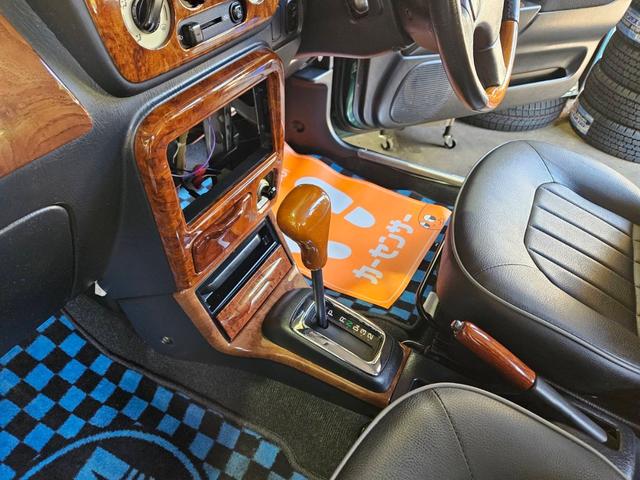 ミラジーノ ミニライトスペシャル　後期型　走行距離３１０００キロ　タイミングベルト＆ウォーターポンプ交換　純正レザー調黒シート　フォグ　Ｆリップ付　黒１４インチアルミ　国産タイヤ４本交換　ウッド調パネル　ウッドコンビハンドル　キーレス（37枚目）