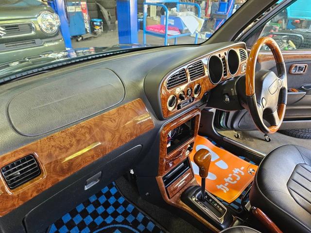 ミラジーノ ミニライトスペシャル　後期型　走行距離３１０００キロ　タイミングベルト＆ウォーターポンプ交換　純正レザー調黒シート　フォグ　Ｆリップ付　黒１４インチアルミ　国産タイヤ４本交換　ウッド調パネル　ウッドコンビハンドル　キーレス（38枚目）