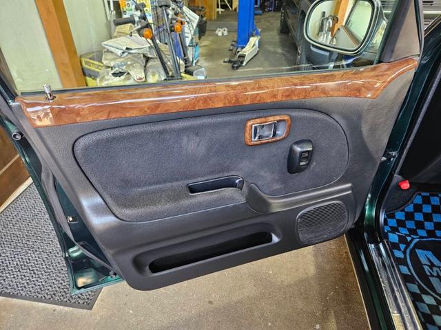 ミラジーノ ミニライトスペシャル　後期型　走行距離３１０００キロ　タイミングベルト＆ウォーターポンプ交換　純正レザー調黒シート　フォグ　Ｆリップ付　黒１４インチアルミ　国産タイヤ４本交換　ウッド調パネル　ウッドコンビハンドル　キーレス（41枚目）