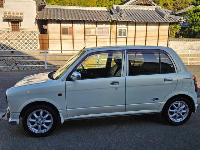 ミラジーノ ミニライトスペシャルターボ　ターボ付　後期型　タイミングベルト＆ウォーターポンプ交換　新品国産タイヤ４本交換　ＨＩＤライト　ミニライトアルミ　新品ブラック革調シートカバー　キーレス　フォグ　ＥＴＣ　フル装備　ルームクリーニング（6枚目）