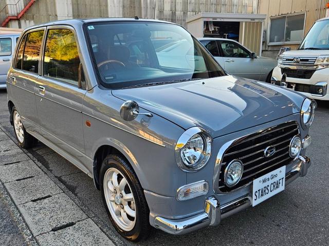 ミラジーノ ジーノターボ　色替グレー塗装済　ターボ　４ＷＤ　５速ミッション　タイミングベルト交換済　ブラウン革調シートカバー　ＣＤ　ＥＴＣ　ヘッドライトバイザー　ミニライトアルミ　フォグ　ウッドコンビハンドル　ウッド調パネル（3枚目）