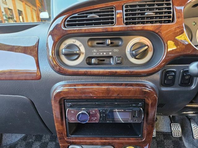 ミラジーノ ジーノターボ　色替グレー塗装済　ターボ　４ＷＤ　５速ミッション　タイミングベルト交換済　ブラウン革調シートカバー　ＣＤ　ＥＴＣ　ヘッドライトバイザー　ミニライトアルミ　フォグ　ウッドコンビハンドル　ウッド調パネル（15枚目）