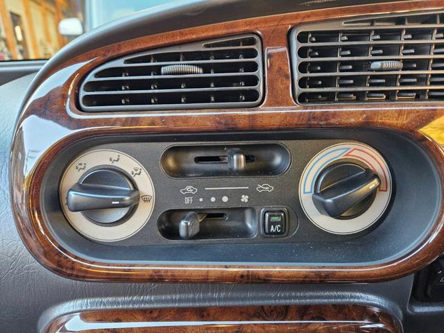 ミラジーノ ジーノターボ　色替グレー塗装済　ターボ　４ＷＤ　５速ミッション　タイミングベルト交換済　ブラウン革調シートカバー　ＣＤ　ＥＴＣ　ヘッドライトバイザー　ミニライトアルミ　フォグ　ウッドコンビハンドル　ウッド調パネル（16枚目）