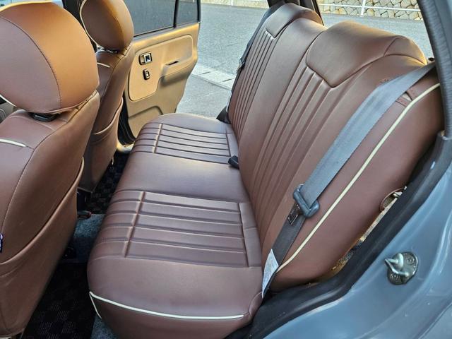 ミラジーノ ジーノターボ　色替グレー塗装済　ターボ　４ＷＤ　５速ミッション　タイミングベルト交換済　ブラウン革調シートカバー　ＣＤ　ＥＴＣ　ヘッドライトバイザー　ミニライトアルミ　フォグ　ウッドコンビハンドル　ウッド調パネル（27枚目）