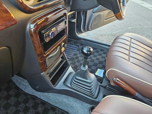 ミラジーノ ジーノターボ　色替グレー塗装済　ターボ　４ＷＤ　５速ミッション　タイミングベルト交換済　ブラウン革調シートカバー　ＣＤ　ＥＴＣ　ヘッドライトバイザー　ミニライトアルミ　フォグ　ウッドコンビハンドル　ウッド調パネル（43枚目）