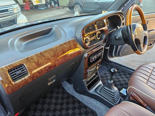 ミラジーノ ジーノターボ　色替グレー塗装済　ターボ　４ＷＤ　５速ミッション　タイミングベルト交換済　ブラウン革調シートカバー　ＣＤ　ＥＴＣ　ヘッドライトバイザー　ミニライトアルミ　フォグ　ウッドコンビハンドル　ウッド調パネル（44枚目）