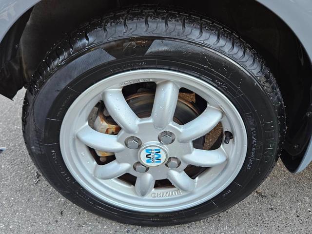ミラジーノ ジーノターボ　色替グレー塗装済　ターボ　４ＷＤ　５速ミッション　タイミングベルト交換済　ブラウン革調シートカバー　ＣＤ　ＥＴＣ　ヘッドライトバイザー　ミニライトアルミ　フォグ　ウッドコンビハンドル　ウッド調パネル（46枚目）