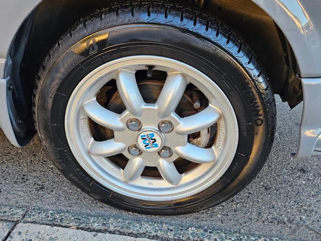 ミラジーノ ジーノターボ　色替グレー塗装済　ターボ　４ＷＤ　５速ミッション　タイミングベルト交換済　ブラウン革調シートカバー　ＣＤ　ＥＴＣ　ヘッドライトバイザー　ミニライトアルミ　フォグ　ウッドコンビハンドル　ウッド調パネル（47枚目）