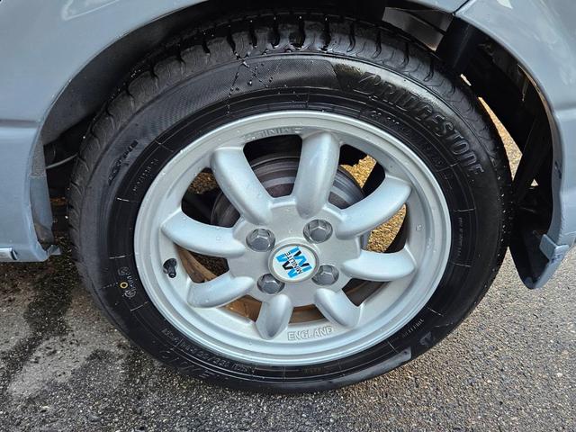 ミラジーノ ジーノターボ　色替グレー塗装済　ターボ　４ＷＤ　５速ミッション　タイミングベルト交換済　ブラウン革調シートカバー　ＣＤ　ＥＴＣ　ヘッドライトバイザー　ミニライトアルミ　フォグ　ウッドコンビハンドル　ウッド調パネル（48枚目）