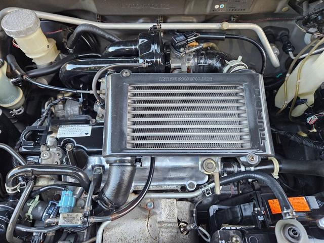 ミラジーノ ジーノターボ　色替グレー塗装済　ターボ　４ＷＤ　５速ミッション　タイミングベルト交換済　ブラウン革調シートカバー　ＣＤ　ＥＴＣ　ヘッドライトバイザー　ミニライトアルミ　フォグ　ウッドコンビハンドル　ウッド調パネル（53枚目）