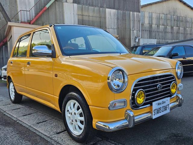 ミラジーノ ジーノ 色替イエロー&ルーフホワイトツートン タイミングベルト・ウォーターポンプ交換 国産新品タイヤ付 ホワイト13アルミ 走行56000キロ キーレス ウッドコンビハンドル オートマ フル装備(2枚目)