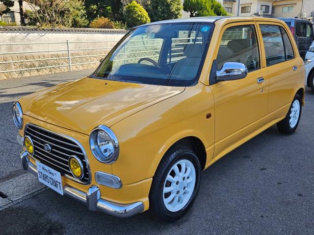 ミラジーノ ジーノ 色替イエロー&ルーフホワイトツートン タイミングベルト・ウォーターポンプ交換 国産新品タイヤ付 ホワイト13アルミ 走行56000キロ キーレス ウッドコンビハンドル オートマ フル装備(5枚目)