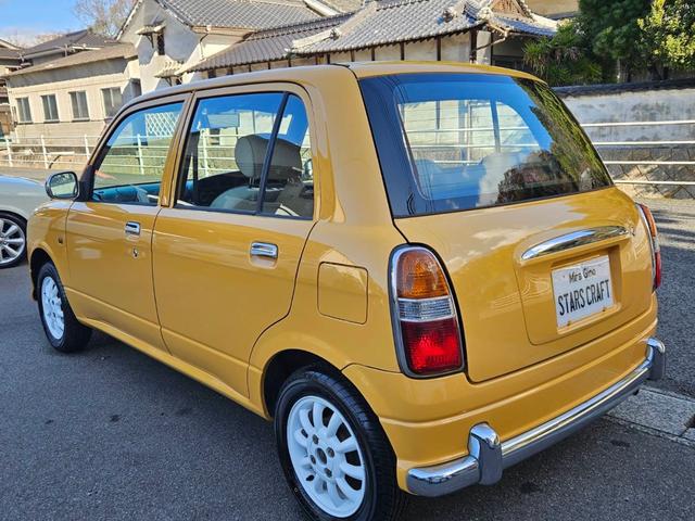 ミラジーノ ジーノ 色替イエロー&ルーフホワイトツートン タイミングベルト・ウォーターポンプ交換 国産新品タイヤ付 ホワイト13アルミ 走行56000キロ キーレス ウッドコンビハンドル オートマ フル装備(10枚目)