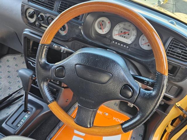 ミラジーノ ジーノ 色替イエロー&ルーフホワイトツートン タイミングベルト・ウォーターポンプ交換 国産新品タイヤ付 ホワイト13アルミ 走行56000キロ キーレス ウッドコンビハンドル オートマ フル装備(15枚目)