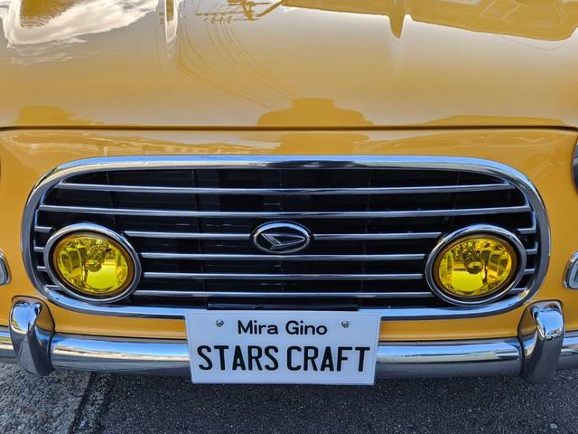 ミラジーノ ジーノ 色替イエロー&ルーフホワイトツートン タイミングベルト・ウォーターポンプ交換 国産新品タイヤ付 ホワイト13アルミ 走行56000キロ キーレス ウッドコンビハンドル オートマ フル装備(22枚目)