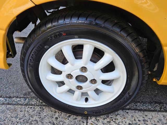 ミラジーノ ジーノ 色替イエロー&ルーフホワイトツートン タイミングベルト・ウォーターポンプ交換 国産新品タイヤ付 ホワイト13アルミ 走行56000キロ キーレス ウッドコンビハンドル オートマ フル装備(29枚目)