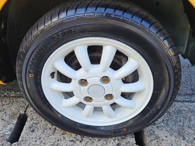 ミラジーノ ジーノ 色替イエロー&ルーフホワイトツートン タイミングベルト・ウォーターポンプ交換 国産新品タイヤ付 ホワイト13アルミ 走行56000キロ キーレス ウッドコンビハンドル オートマ フル装備(30枚目)