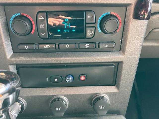 ハマーH2 タイプG 4WD 左ハンドル ETC バックカメラ パワーシート サンルーフ ナビ オートライト シートヒーター AT Bluetooth 後席モニター(9枚目)