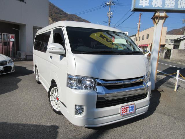 ハイエースワゴン GL キャプテンシート4脚/BIGX11インチナビ/フリップダウンモニター/UIリアスタビ/BLITZマフラー/コブラボンネット/F、左S、Rカメラ/デジタルインナーミラー/スロコン/クルコン/パドルシフト(2枚目)