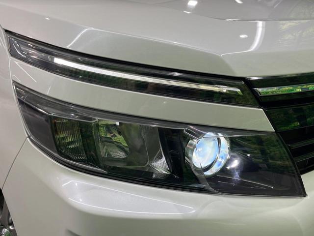 ヴォクシー ハイブリッドV 後席モニター バックカメラ 衝突被害軽減システム スマートキー LEDヘッド ビルトインETC クルコン オートライト デュアルエアコン Bluetooth CD DVD再生 フルセグ LEDフォグ(25枚目)