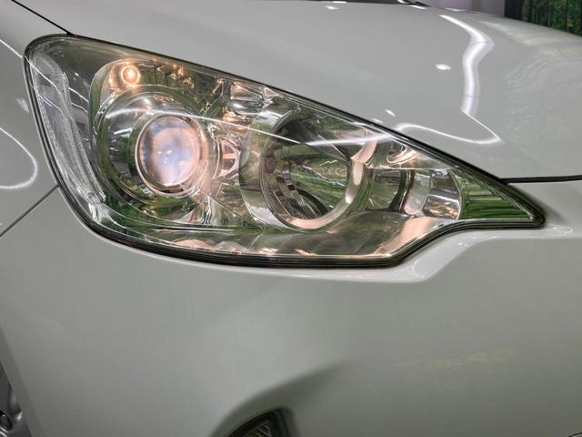 アクア Ｇブラックソフトレザーセレクション　バックカメラ　ハーフレザーシート　ＨＩＤヘッド　ＥＴＣ　純正１５インチアルミ　オートエアコン　ＣＤ　ＤＶＤ再生　地デジ（16枚目）