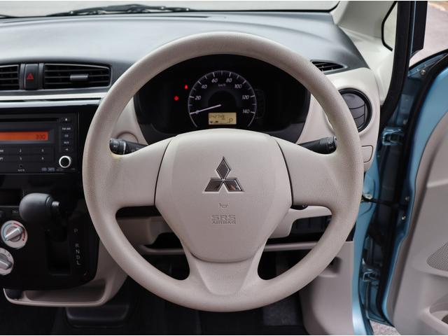 ｅＫワゴン Ｅ　キーレス　運転席シートヒーター　運転席助手席エアバック　パワーウィンドウ　電動格納ミラー　ＣＤオーディオ　ＡＵＸ　ベンチシート　パワーステアリング　フロアマット　サイドドアバイザー　マニュアルエアコン（10枚目）