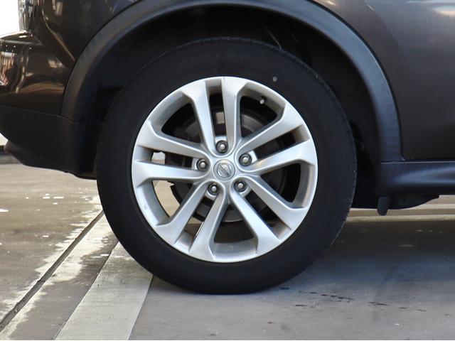 ジューク 16GT FOUR タイプV 4WD ターボ ナビ ETC スマートキー オートライト フロントフォグランプ 純正アルミホイール フルセグ 電動格納ミラー フロアマット サイドドアバイザー 運転席・助手席エアバック オートエアコン(53枚目)