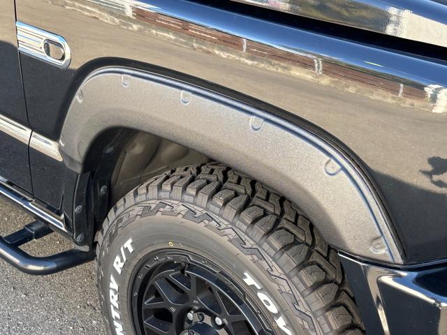 ジムニー XC グレッディマフラー シートカバー ナビ バックモニター ロッソモデロ トーヨータイヤオープンカントリー(17枚目)