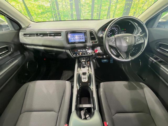 ヴェゼル ハイブリッドX・ホンダセンシング 純正ナビ バックカメラ 衝突軽減装置 ドラレコ ETC レーダークルーズ LEDヘッド パドルシフト ステアリングスイッチ 純正16インチアルミ オートライト オートエアコン 車線逸脱警報 禁煙車(2枚目)