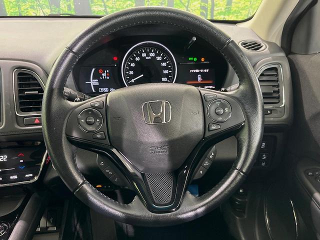 ヴェゼル ハイブリッドX・ホンダセンシング 純正ナビ バックカメラ 衝突軽減装置 ドラレコ ETC レーダークルーズ LEDヘッド パドルシフト ステアリングスイッチ 純正16インチアルミ オートライト オートエアコン 車線逸脱警報 禁煙車(11枚目)