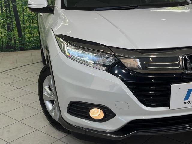 ヴェゼル ハイブリッドX・ホンダセンシング 純正ナビ バックカメラ 衝突軽減装置 ドラレコ ETC レーダークルーズ LEDヘッド パドルシフト ステアリングスイッチ 純正16インチアルミ オートライト オートエアコン 車線逸脱警報 禁煙車(12枚目)