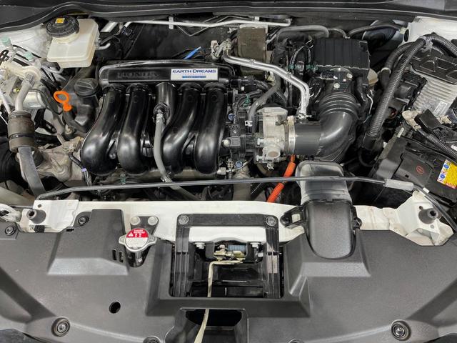 ヴェゼル ハイブリッドX・ホンダセンシング 純正ナビ バックカメラ 衝突軽減装置 ドラレコ ETC レーダークルーズ LEDヘッド パドルシフト ステアリングスイッチ 純正16インチアルミ オートライト オートエアコン 車線逸脱警報 禁煙車(18枚目)