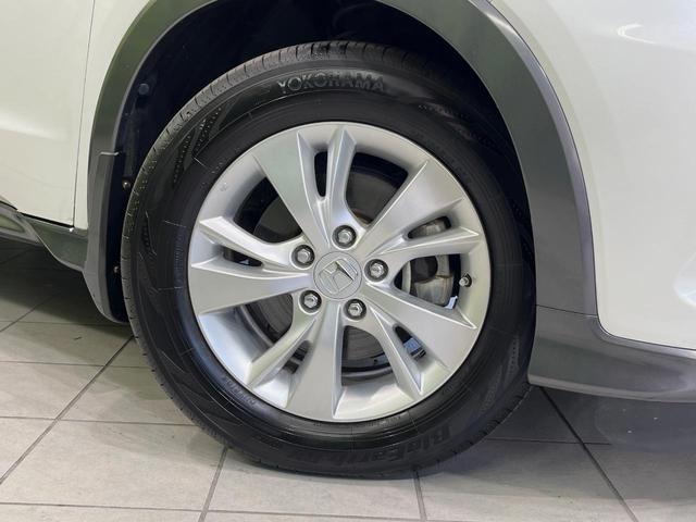 ヴェゼル ハイブリッドX・ホンダセンシング 純正ナビ バックカメラ 衝突軽減装置 ドラレコ ETC レーダークルーズ LEDヘッド パドルシフト ステアリングスイッチ 純正16インチアルミ オートライト オートエアコン 車線逸脱警報 禁煙車(63枚目)