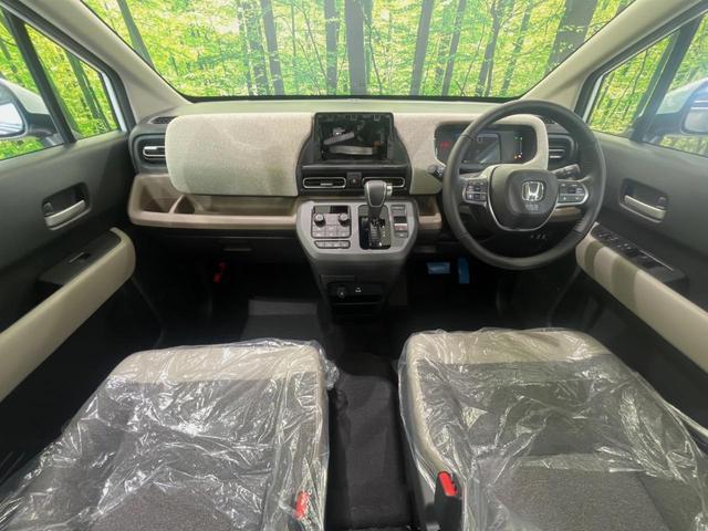 フリード e:HEVエアー EX 登録済未使用車 両側電動スライドドア 衝突軽減装置 レーダークルーズ ハーフレザーシート 前席シートヒーター コーナーセンサー スマートキー LEDヘッドライト オートマチックハイビーム 車線逸脱警報(2枚目)